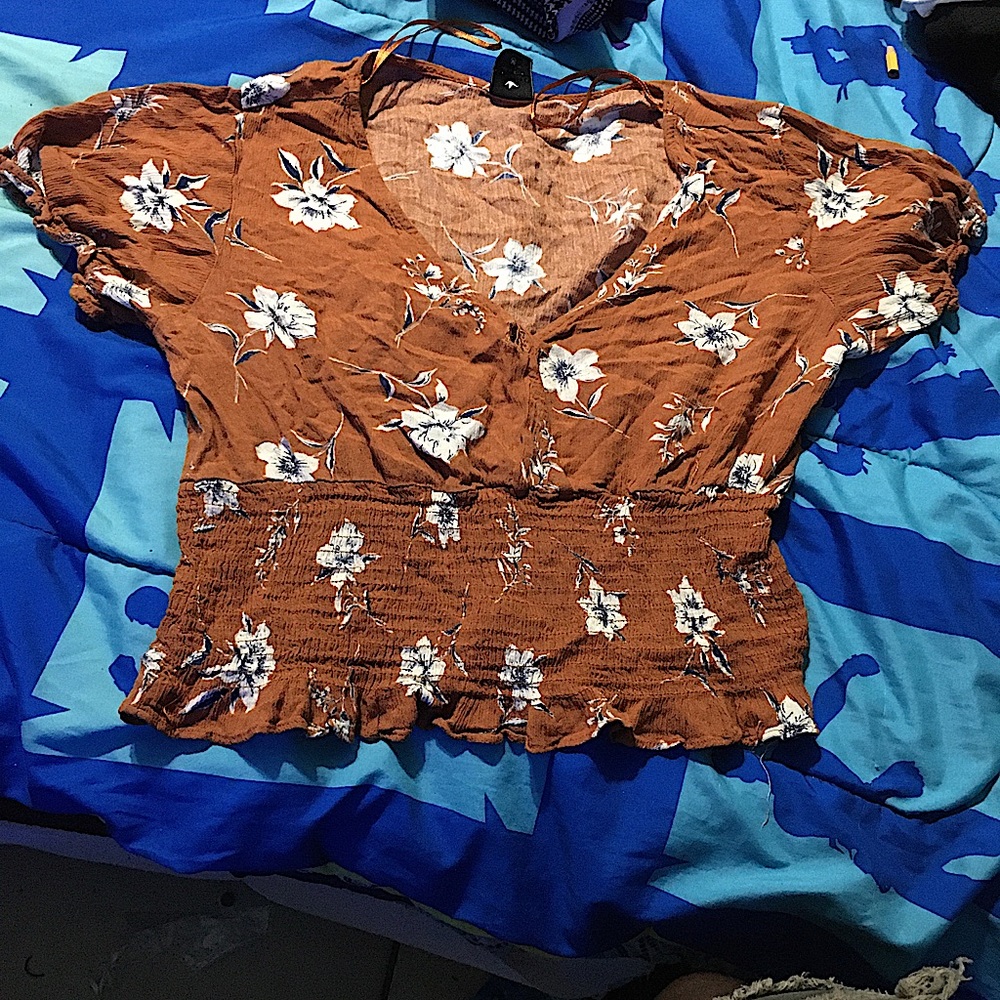 A cropped top with floral design
